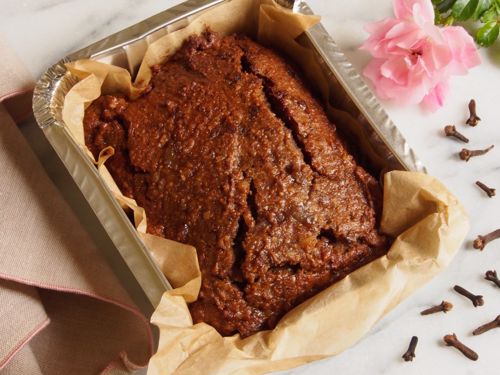 Picture of Frozen -- Walnut Date Cake with Rose Water and Persian Spices --  9 oz by weight in a small tin (5 in x 4 in)